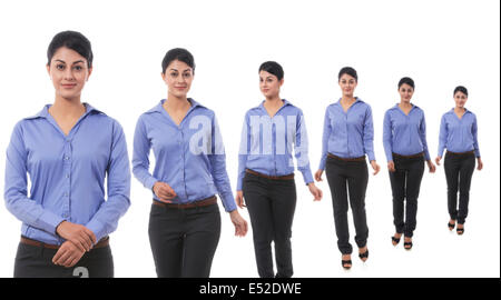 Multiple image of well-dressed businesswoman against white background Stock Photo