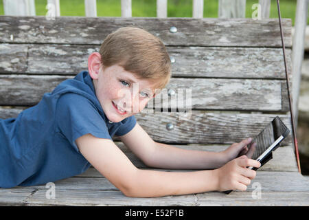 A young boy outdoors. Stock Photo