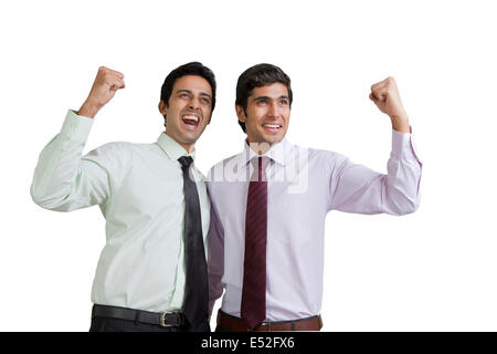 Business executives cheering Stock Photo