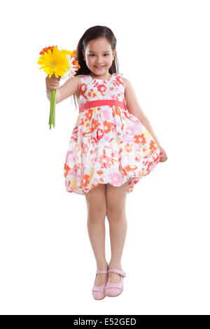 Portrait of little girl with flowers Stock Photo
