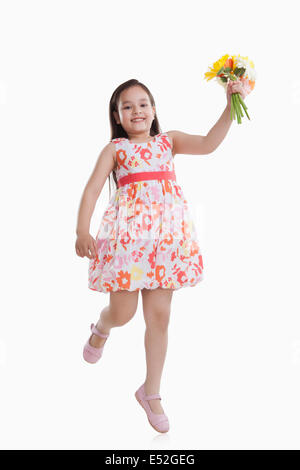 Portrait of little girl with flowers Stock Photo