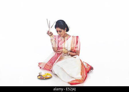 Bengali woman holding an agarbatti Stock Photo