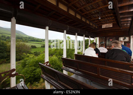 Isle of Man, Manx Electric Railway, passengers in open car at North Barrule Stock Photo