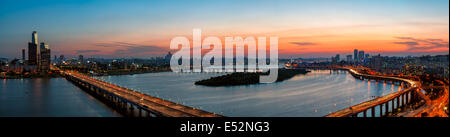 A colorful sunset over the Yeouido business district and the Han River of Seoul, South Korea. Stock Photo