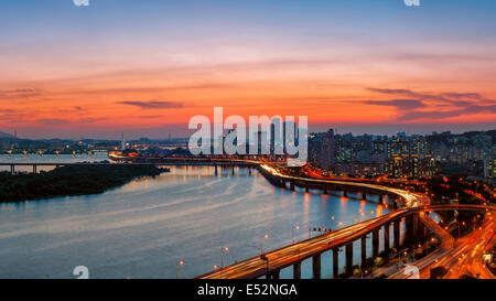 A colorful sunset over the Yeouido business district and the Han River of Seoul, South Korea. Stock Photo