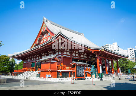 Tourists and sightseers move around in a blur at Sensoji Temple in Tokyo, Japan. Stock Photo