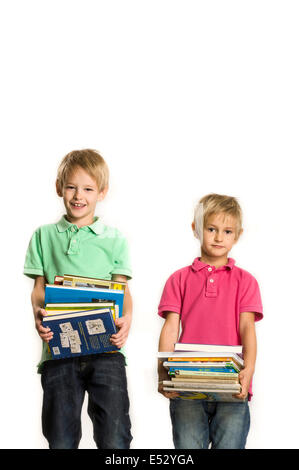 young brothers holding books Stock Photo