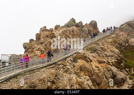 People tourists on stairway to Point Reyes Lighthouse in Point Reyes National Seashore Marin County California United States Nor Stock Photo