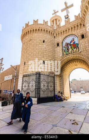 Coptic monks at the entrance of Deir al-Muharraq monastery. Egypt Stock Photo
