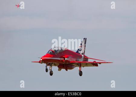 Farnborough, uk,18th July 2014, The red arrows coming in to land at the Farnborough Airshow 201 Credit: Keith Larby/Alamy Live News Stock Photo