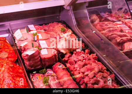Display of pork products in a butchers display cabinet in the English Market in Cork City, Ireland. Stock Photo