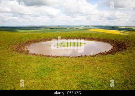 Dew pond water supply on the top of Tan Hill, All Cannings, Wiltshire, England Stock Photo