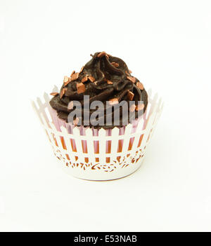 Cupcake with Chocolate top with bronze sprinkles and wrapper Stock Photo