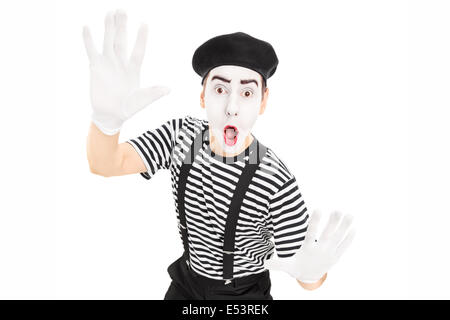 Male actor mimicking with hands Stock Photo