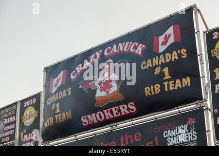 Signage for a 'Crazy Canuck Smokers' food stand at the 'Sound of Music Festival' at Spencer Smith Park in Burlington, Ontario. Stock Photo