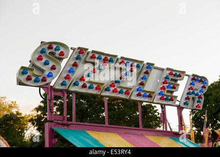 Signage for a ride called 'Sizzler' at the 'Sound of Music Festival' at Spencer Smith Park in Burlington, Ontario, Canada. Stock Photo
