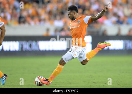 Houston, Texas, USA. 19th July, 2014. Houston Dynamo forward Giles Barnes (23) scores a goal in the 26th minute during an MLS game between the Houston Dynamo and Toronto FC at BBVA Compass Stadium in Houston, TX on July 19th, 2014. The game ended in a 2-2 draw. Credit:  Trask Smith/ZUMA Wire/Alamy Live News Stock Photo