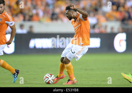 Houston, Texas, USA. 19th July, 2014. Houston Dynamo forward Giles Barnes (23) scores a goal in the 26th minute during an MLS game between the Houston Dynamo and Toronto FC at BBVA Compass Stadium in Houston, TX on July 19th, 2014. The game ended in a 2-2 draw. Credit:  Trask Smith/ZUMA Wire/Alamy Live News Stock Photo