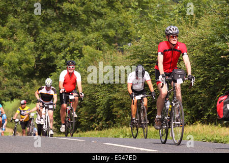 Mendip Hills, Somerset UK – Sunday 20th July 2014 – 1,000 cyclists took part in the Great Weston Ride cycling 56 miles from Bristol to Weston Super Mare via the Mendip Hills. Here riders struggle with the hills and the summer heat as they tackle the long climb at Burrington Combe raising money for Prostate Cancer UK Stock Photo