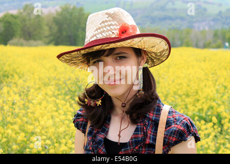 Beautiful teenage girl dressed as a cowgirl Stock Photo