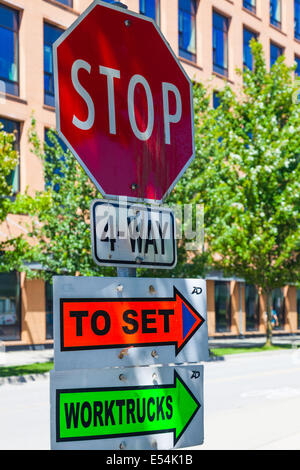 Movie set signs attached to a street Stop Sign in Vancouver, Canada Stock Photo