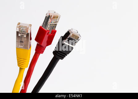 Image shows three colored network cables in black, Red, Yellow Stock Photo