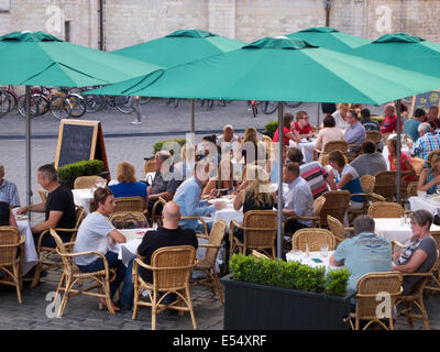 People enjoying their meal outside at a restaurant in the city center of Breda, the Netherlands Stock Photo