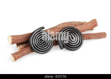 Licorice roots and wheels isolated on white Stock Photo