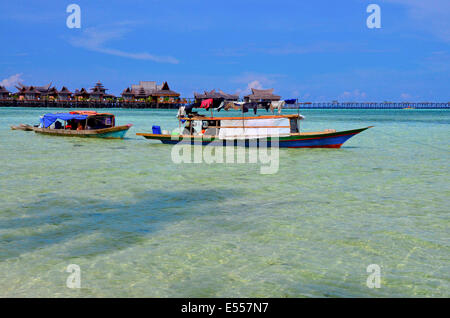 Bajau, sea nomads in traditional wooden boats, Celebes Sea, Malaysia, Stock Photo