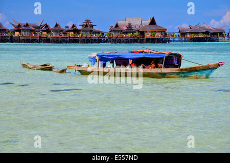 Bajau, sea nomads in traditional wooden boats, Celebes Sea, Malaysia, Stock Photo