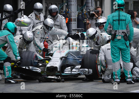 Hockenheim, Germany. 20th July, 2014. British Formula One driver Lewis Hamilton from team Mercedes AMG does a pit stop during the German Formula One Grand Prix at the Hockenheimring race track in Hockenheim, Germany, 20 July 2014. Photo: DAVID EBENER/DPA/Alamy Live News Stock Photo