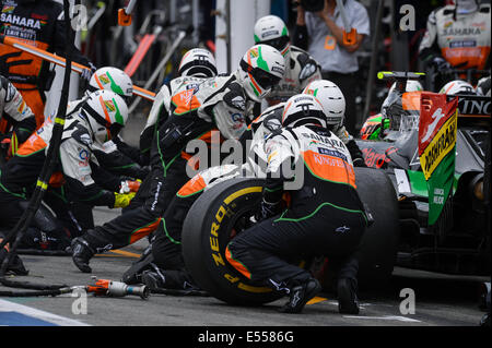 Hockenheim, Germany. 20th July, 2014. Mexican Formula One driver Sergio Perez from team Force India does a pit stop during the German Formula One Grand Prix at the Hockenheimring race track in Hockenheim, Germany, 20 July 2014. Photo: DAVID EBENER/DPA/Alamy Live News Stock Photo