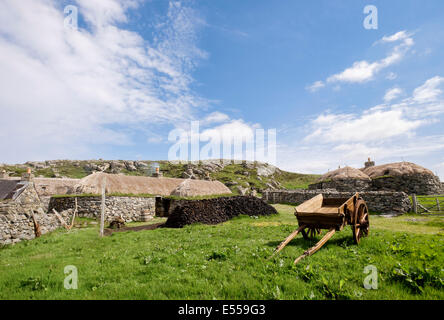 Old cart and crofts in Na Gearrannan Blackhouse Village. Garenin Carloway Isle of Lewis Outer Hebrides Western Isles Scotland UK Stock Photo