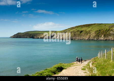 UK, Wales, Gwynedd, Lleyn peninsula, Aberdaron, walkers on Wales Coast Path around Uwchmynydd Stock Photo