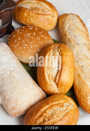 Freshly baked traditional rolls on cotton cloth Stock Photo