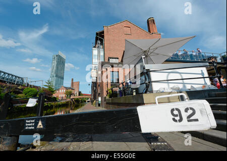 The Castlefield historic inner city canal area including Dukes 92 and lock and Beetham Tower (background) in Manchester UK Stock Photo