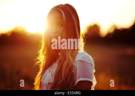 Portrait of a young woman in backlight Stock Photo