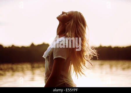 Portrait of a young woman in backlight Stock Photo