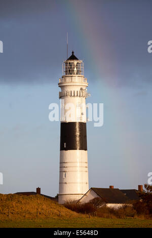 Rainbow over the Kampen lighthouse, also Red Cliff lighthouse, Kampen, Sylt, North Frisian Islands, Schleswig-Holstein, Germany Stock Photo