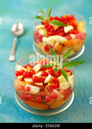 Fruit salad with stevia and lemon verbena. Recipe available. Stock Photo