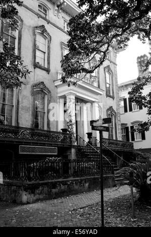 Restored, refined residential architecture and gardens delight throughout the historical Victorian district of Savannah, Georgia Stock Photo