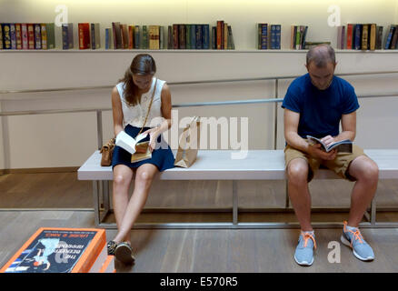 Customers browsing books in a London bookshop Stock Photo