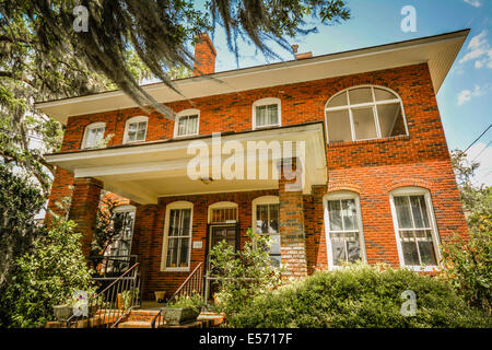 Lovely brick Colonial office building at the entrance to the Bonaventure Cemetery in Savannah, GA, USA Stock Photo