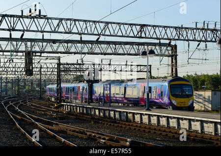 A First TransPennine ADtranz / Bombardier Express Class 170 Turbostar enters Manchester Piccadilly Rail Station. Stock Photo