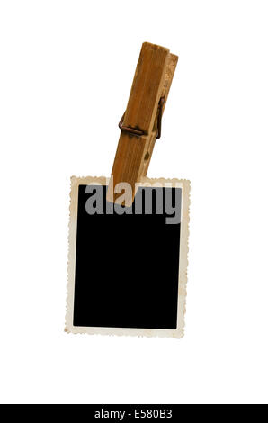 Hanging aged photo frames isolated on white background Stock Photo