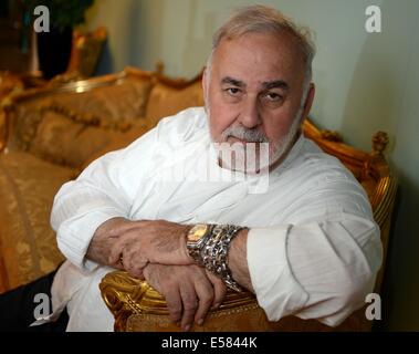 FILE - Hairdresser Udo Walz poses at his hair salon in Berlin, Germany, 16 July 2014. Walz will turn 70 on 28 July 2014. Photo: BRITTA PEDERSEN/dpa Stock Photo