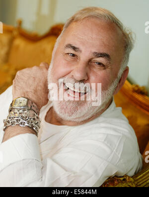 FILE - Hairdresser Udo Walz poses at his hair salon in Berlin, Germany, 16 July 2014. Walz will turn 70 on 28 July 2014. Photo: BRITTA PEDERSEN/dpa Stock Photo