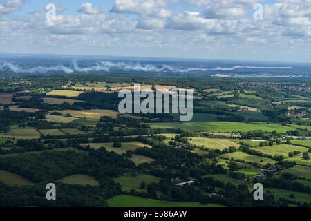 An unusual aerial view of the Red Arrows displaying at the 2014 Farnborough Air Show. Stock Photo