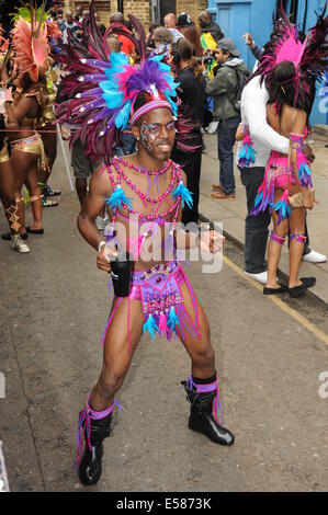 Photograph of a man in traditional Caribbean festival clothing at Notting Hill Carnival Stock Photo