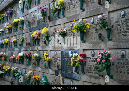 Fresh flowers adorn the burial vaults of the village cemetery, Porto Venere, Italy Stock Photo